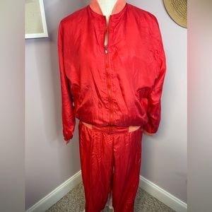 Details Express women’s small windsuit. Jogger type pants & zip up jacket